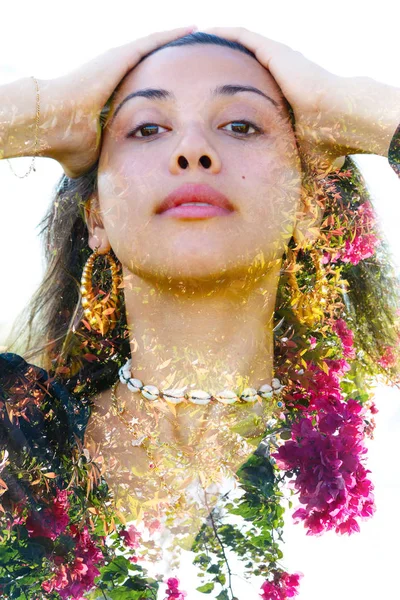 Double exposure portrait of a beautiful exotic woman with hands — Stock Photo, Image