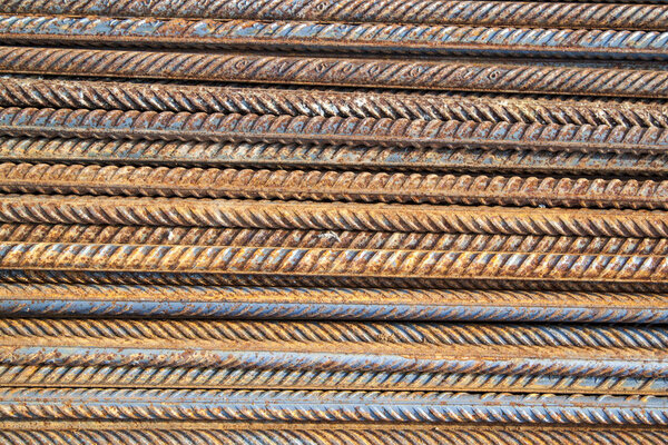 top view of the reinforcing steel bar stack close-up, rebar for concrete construction works piled on top of each other