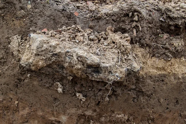 Close View Cut Soil Black Stone — Stock Photo, Image