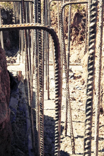 Reinforcement of concrete with metal rods connected by wire. Preparation for pouring the Foundation — Stock Image Reinforcement Concrete Metal Rods Connected Wire Preparation Pouring Foundation Stock Photo