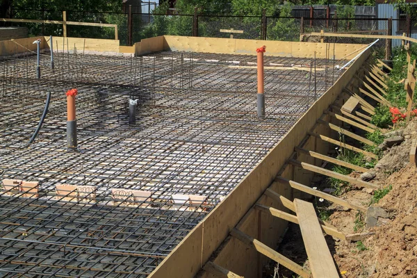 Reinforcement of concrete with metal rods connected by wire. Pre — Stock Image Reinforcement of concrete with metal rods connected by wire. Pre Royalty Free Stock Photos