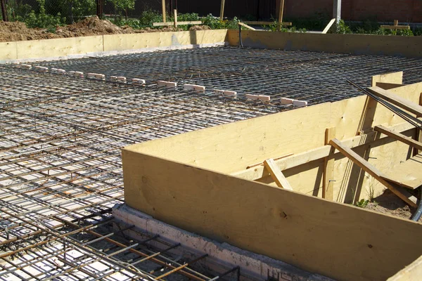 Reinforcement of concrete with metal rods connected by wire. Pre — Stock Image Reinforcement of concrete with metal rods connected by wire. Pre Royalty Free Stock Images