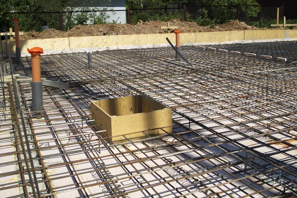 Reinforcement of concrete with metal rods connected by wire. Pre — Stock Photo, Image