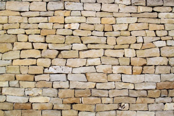 ベージュ石レンガ壁テクスチャの背景 — ストック写真