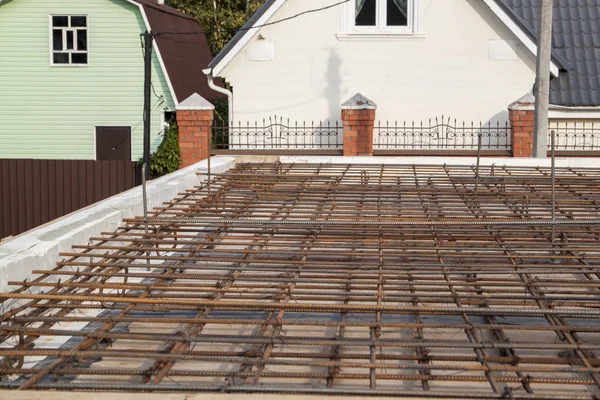 Reinforcement of concrete with metal rods connected by wire. vie — Stock Image Reinforcement of concrete with metal rods connected by wire. vie Stock Image