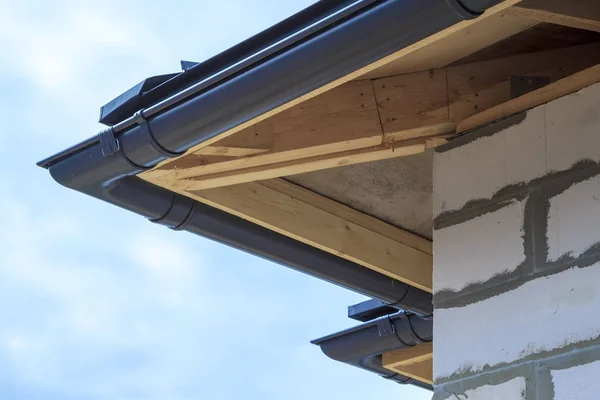 Close up view of house under construction with holders for gutte — Stock Image Close up view of house under construction with holders for gutte Royalty Free Stock Photos