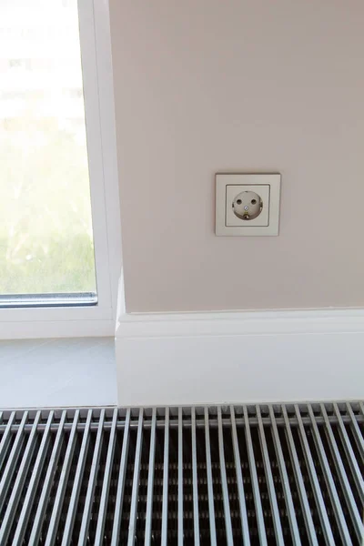 Electrical Outlet Located Wall White Wooden Skirting Board Convector Built — Stock Photo, Image