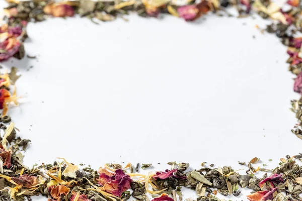 Κορνίζα Πράσινο Τσάι Αποξηραμένα Πέταλα Λουλουδιών Και Κομμάτια Των Εσπεριδοειδών — Φωτογραφία Αρχείου