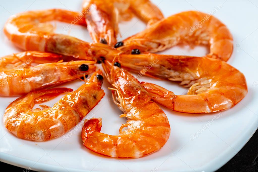 Grilled prawns close up. Royal delicious and beautiful shrimp. Flatley. Food background