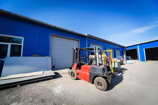 cargo doors at big industrial warehouse building