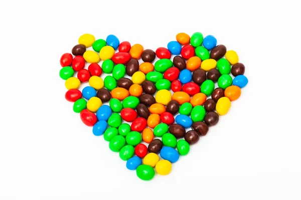 Schöne Süßigkeiten auf weißem Hintergrund — Stockfoto