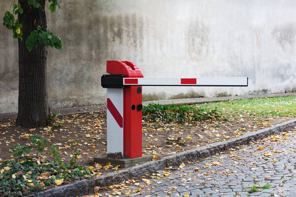 automatic barrier on the road, autumn
