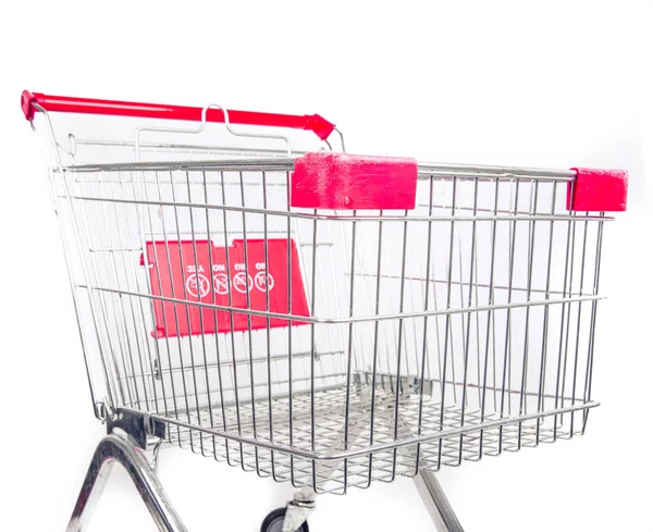 Supermarket trolley cart isolated on white — Stock Photo, Image