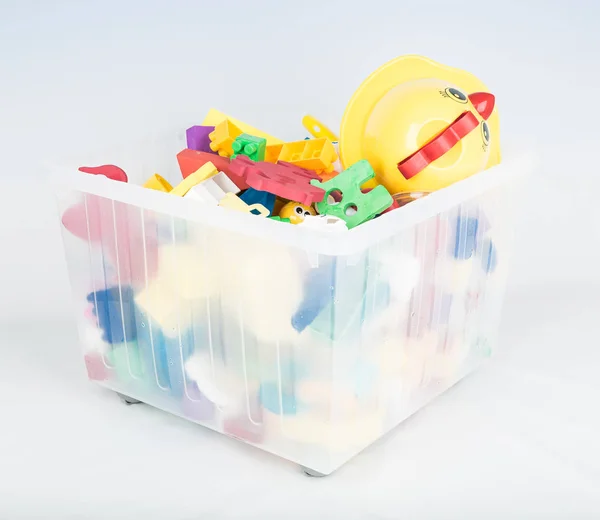 Plastic container with toys for kids — Stock Photo, Image