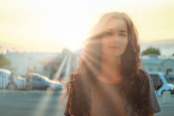 Soft Focus blurry portrait of cute woman in sunset sunrays — Stock Photo, Image