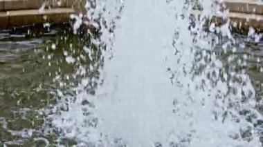 Splashing water of park fountain