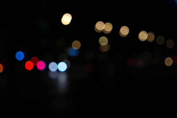 Abstrato imagem bokeh luzes na cidade da noite — Fotografia de Stock