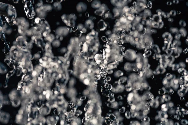 Połowa rozmytym połowę w ostrości krople wody w powietrzu — Zdjęcie stockowe