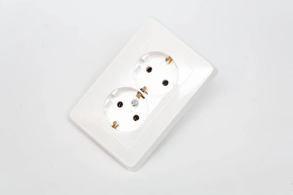 twin Electrical Outlet image with copyspace from above. Electrical outlet replacement of electric socket in household power network