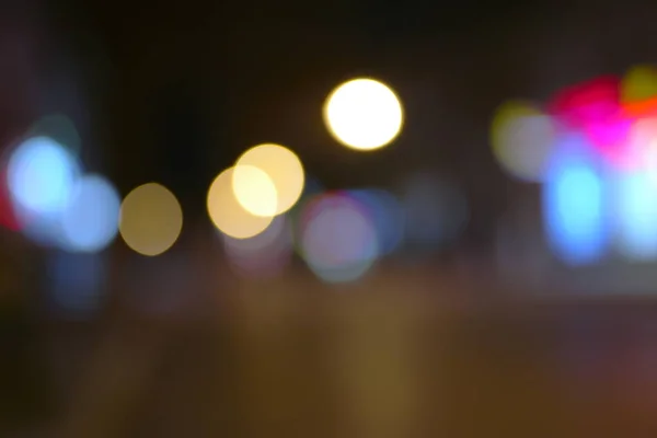 Desenfoque linternas de noche en la calle — Foto de Stock
