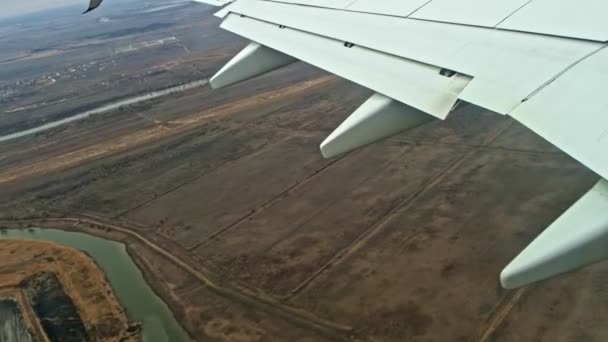 Fragment of plane wing ready for landing — Stock Video