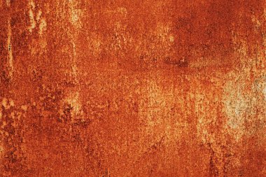 Parlak kırmızı-turuncu demir levha. Pas bileşiği bir demir oksittir..
