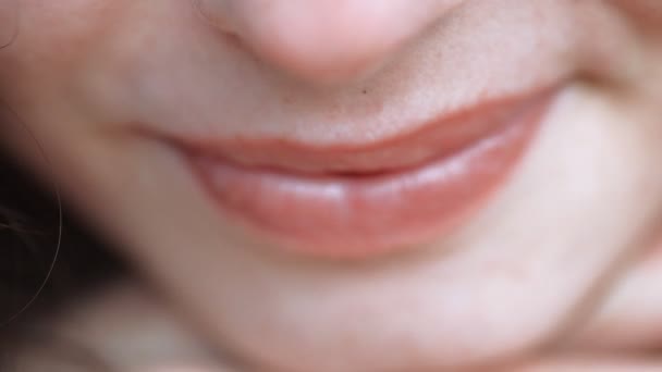 Very closeup of womans lips shallow DOF — Stock Video