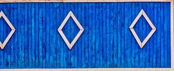 Rural wooden fence painted in blue color — Stock Photo, Image