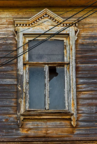Weathered wooden window in slums with broken glass — Stock Image Weathered wooden window in slums with broken glass Royalty Free Stock Photos