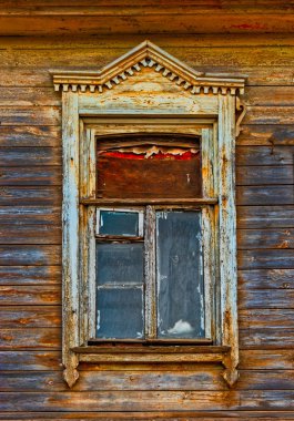 Wooden window carved frame of wooden lacy in Astrakhan Russia