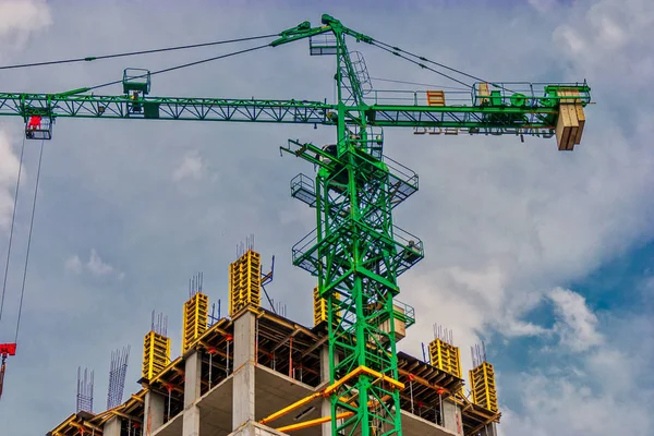 Work site with crane in front of the sky — Stock Photo, Image