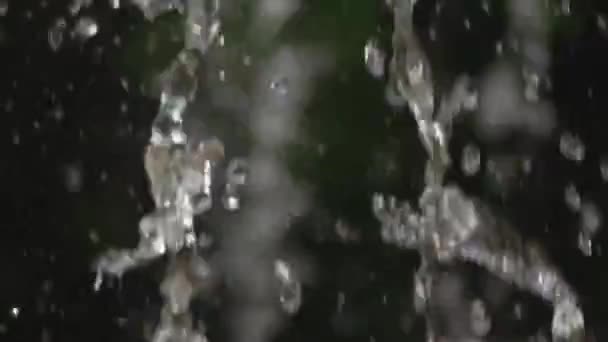 Water droplets fly in the air slomo — Stock Video