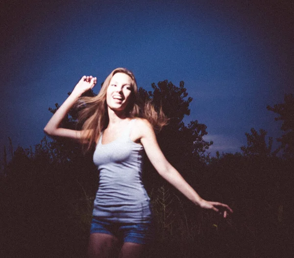 Blurred Grainy Photo Young Lady Dancing Extatic Night Her Arm — Stock Photo, Image