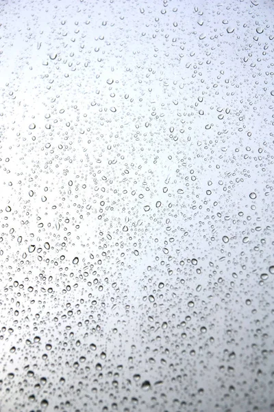 Gotas de lluvia en la ventana — Foto de Stock