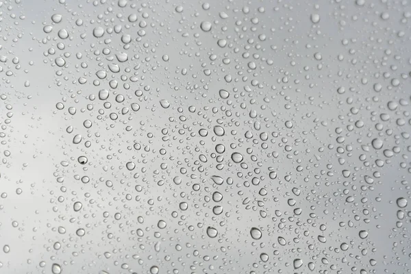 Gotas de lluvia en la ventana — Foto de Stock