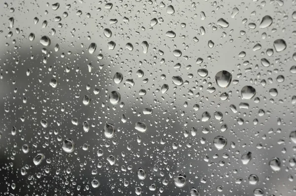 창문에 빗방울 스톡 사진