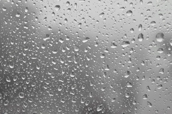 Gotas de lluvia en la ventana — Foto de Stock