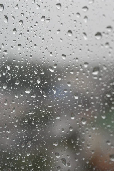 Drops of rain on the window, rainy day — Stock Photo, Image