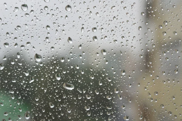 Drops of rain on the window, rainy day — Stock Photo, Image