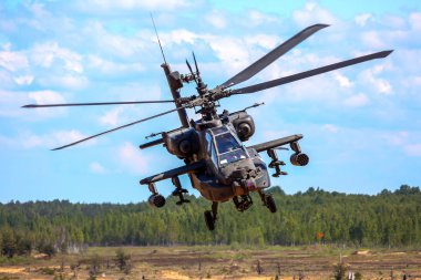 UH-60 Blackhawk and Apache. International Military Training Saber Strike 2017, Adazi, Latvia, from 3 to 15 June 2017. US Army Europe-led annual International militaryexercise Saber Strike Field Training Exercisein Latvia. clipart