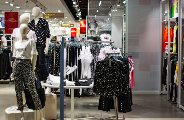 Minsk, Belarus - July 21, 2018: sale inside Clothing store at shopping center