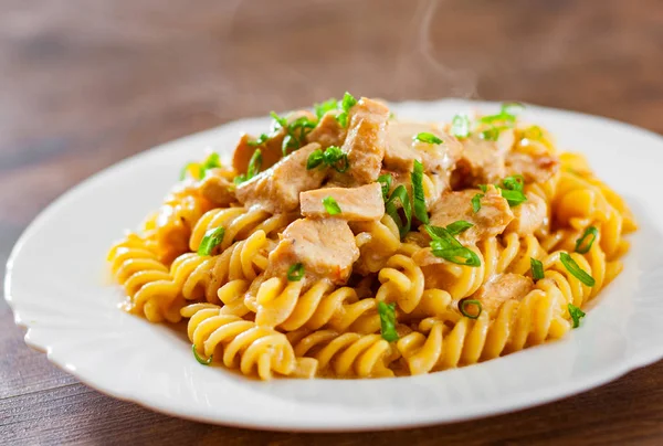 Sliced Fried Chicken Fillet Creamy Sauce Fusilli Pasta White Plate — Stock Photo, Image