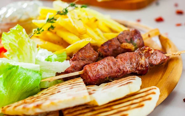 Souvlaki Salad French Fries Potato Pita Tzatziki Sauce Wooden Plate — Stock Photo, Image