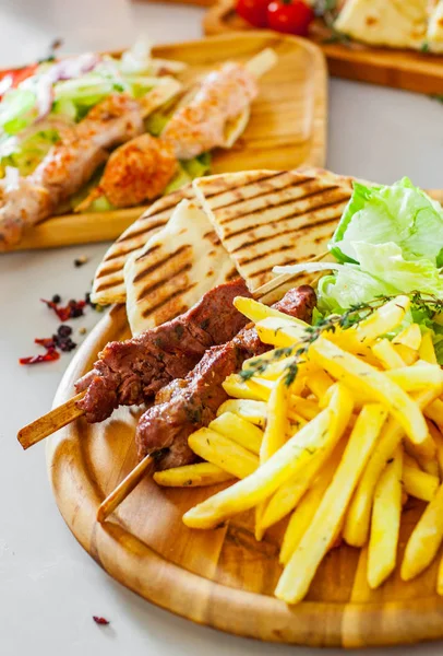 Souvlaki Salad French Fries Potato Pita Tzatziki Sauce Wooden Plate — Stock Photo, Image