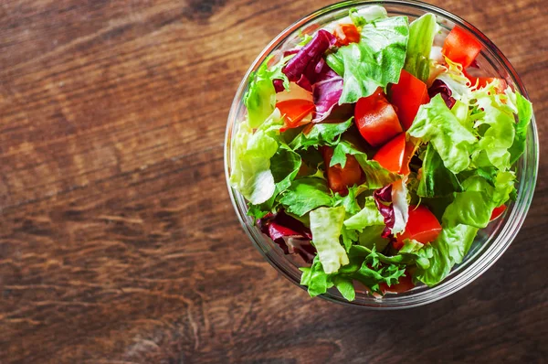 Various Fresh Mix Salad Leaves Tomato Glass Bowl Wooden Background — Stock Photo, Image