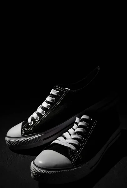 Pair New Black Sneakers Dark Black Background Copy Space — Stock Photo, Image