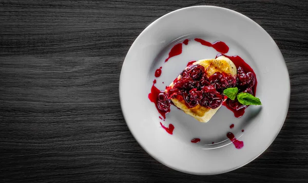 Halloumi Cheese Frying Cherry Plate Black Wooden Table — Stock Photo, Image