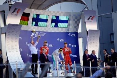 Soçi, Rusya - 30 Nisan 2017: İlk üç bitirenler Valtteri Bottas Mercedes, Sebastian Vettel ve Kimi Raikkonen Ferrari podyum üzerinde Grand Prix Rusya'nın Soçi, sırasında kutlamak.