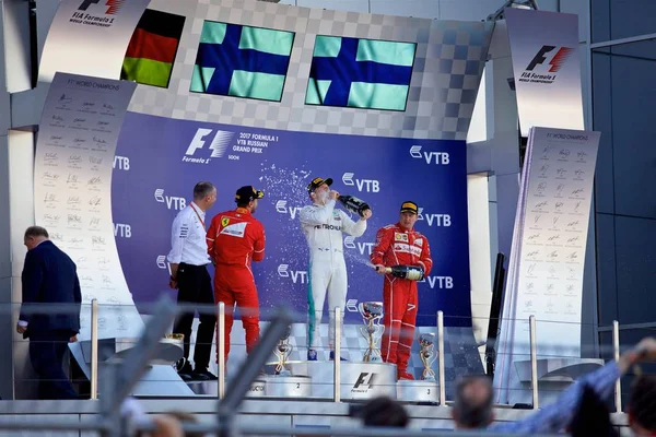 Soçi, Rusya - 30 Nisan 2017: İlk üç bitirenler Valtteri Bottas Mercedes, Sebastian Vettel ve Kimi Raikkonen Ferrari podyum üzerinde Grand Prix Rusya'nın Soçi, sırasında kutlamak.
