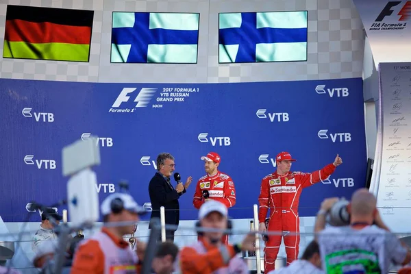 Soçi, Rusya - 30 Nisan 2017: İlk üç bitirenler Valtteri Bottas Mercedes, Sebastian Vettel ve Kimi Raikkonen Ferrari podyum üzerinde Grand Prix Rusya'nın Soçi, sırasında kutlamak.